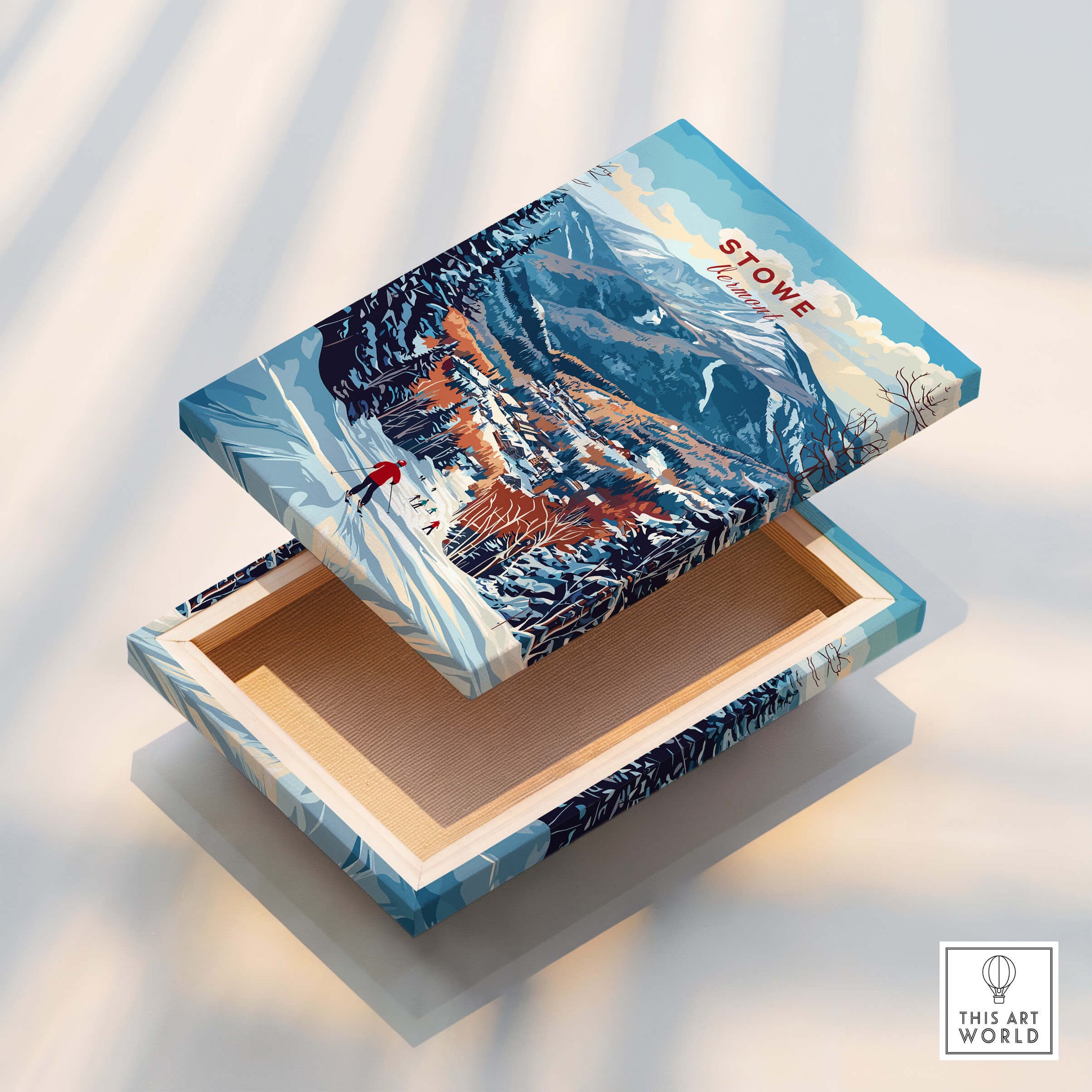 Stowe Mountain Range Poster - Vermont Skiing Print, Alpine Wall Art on a decorative box showcasing a snowy landscape.