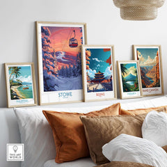 Framed art prints featuring Stowe Vermont ski poster among landscapes of Philippines, Beijing, Costa Rica, and Grand Canyon.