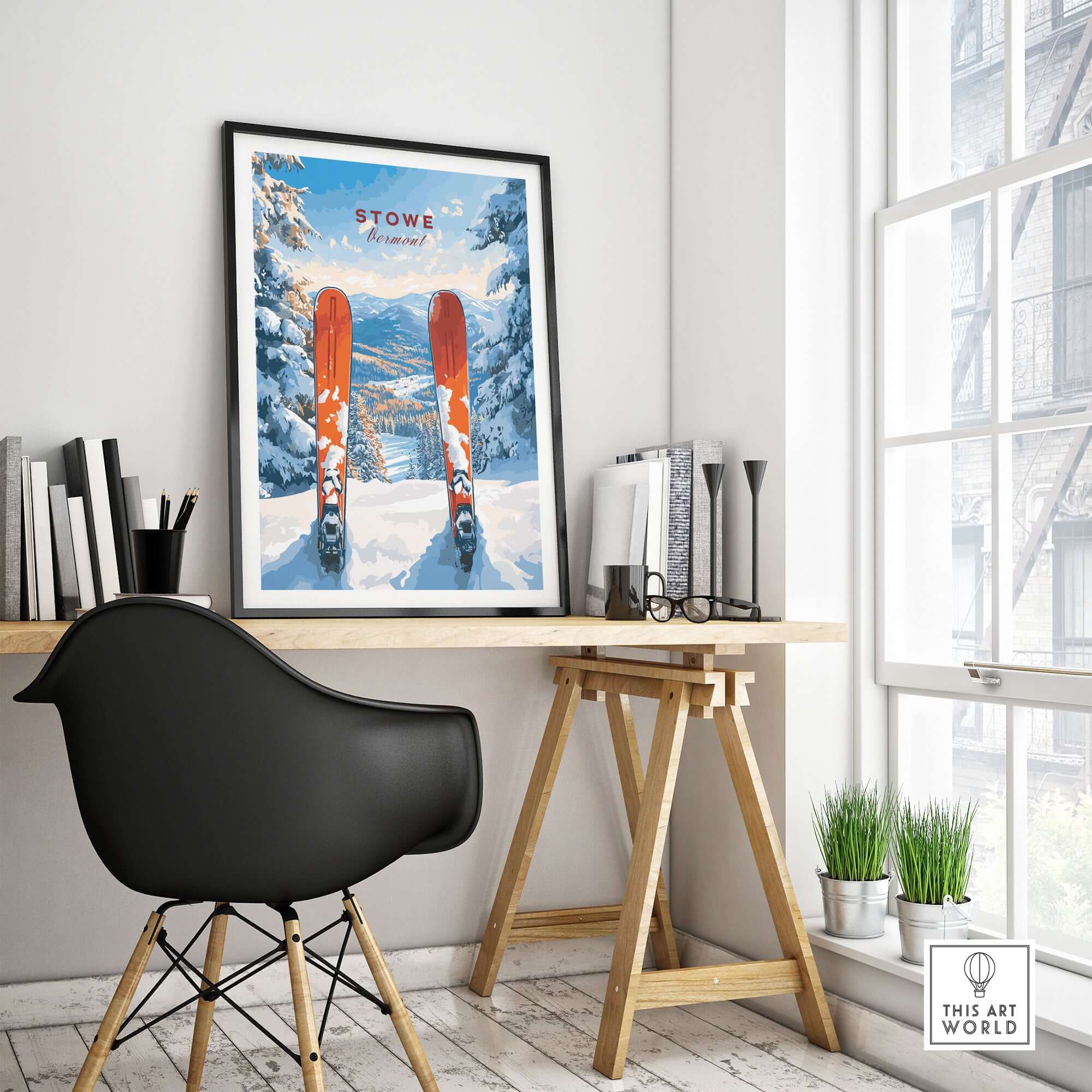 Stowe Vermont ski print hanging in a modern workspace, showcasing a snowy mountain scene and skiing wall decor.