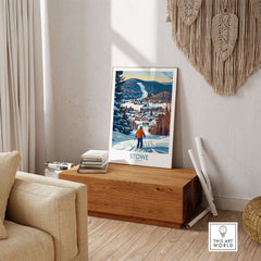 Stowe Vermont ski village art print showcasing a colorful mountain view in a cozy indoor setting.