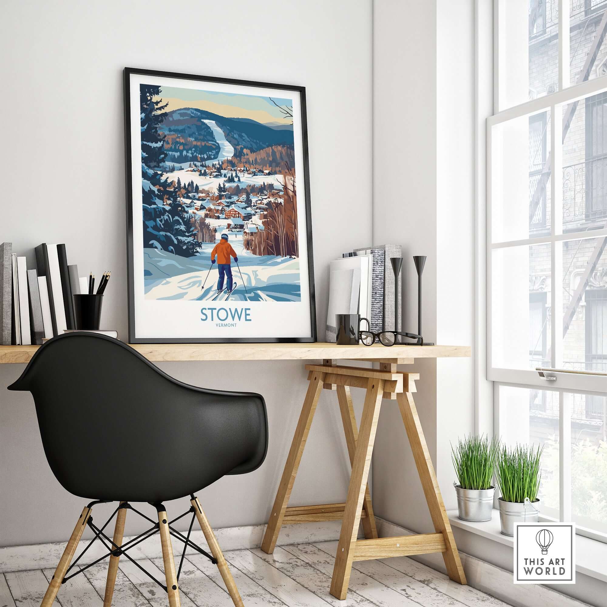 Stowe Vermont ski village art print featuring a mountain view, displayed in a cozy home office setting.