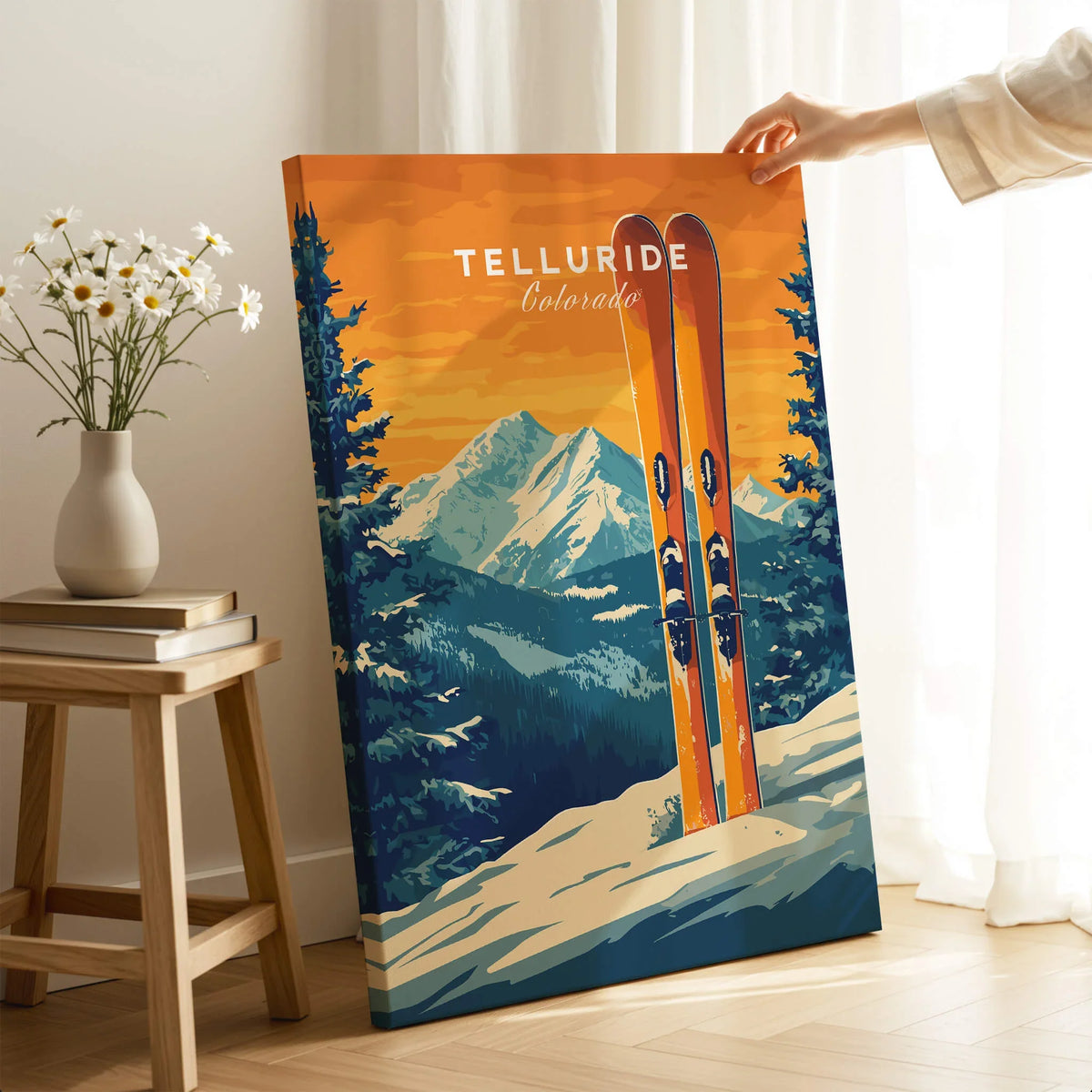 Telluride Travel Poster - Colorado featuring vibrant ski artwork and mountain scenery in a cozy home setting.