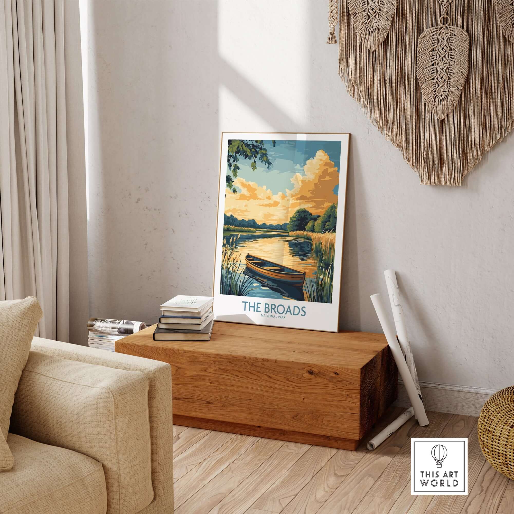 The Broads National Park Art Print displayed on a wooden surface in a serene home interior setting.