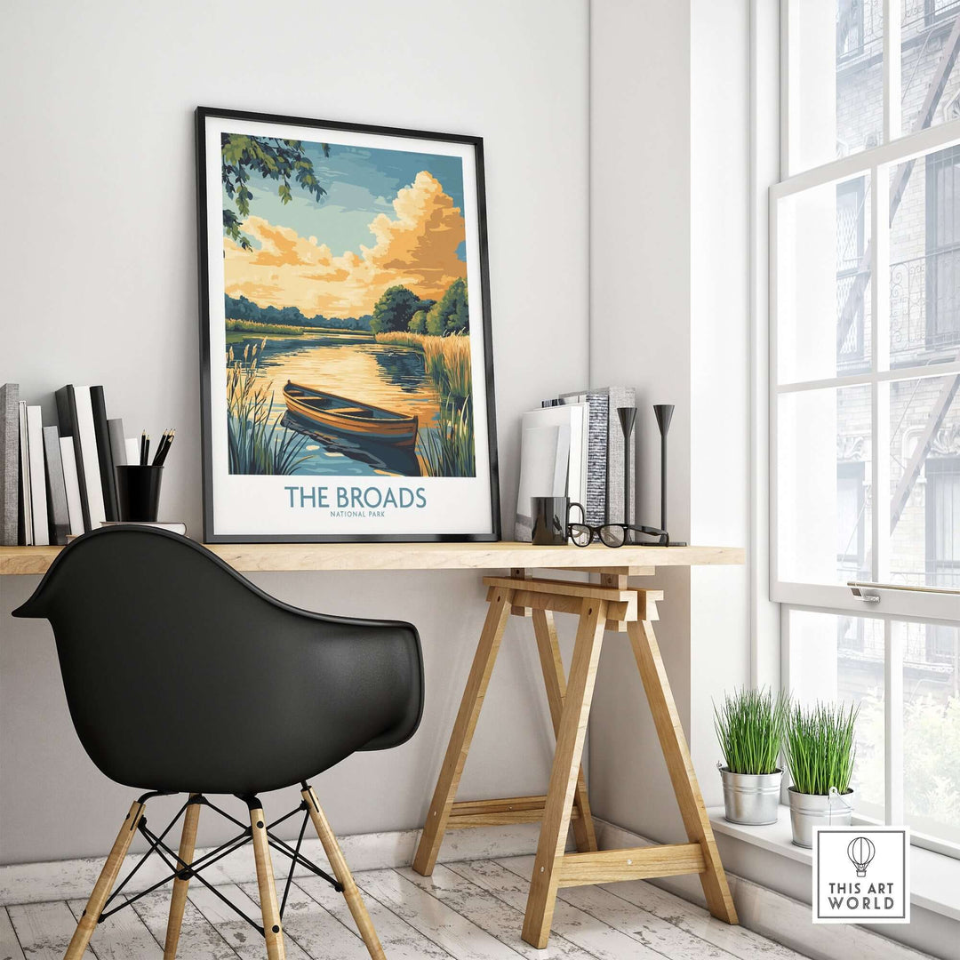 Art print of The Broads National Park displayed in a stylish office setting with a serene river scene and boat.