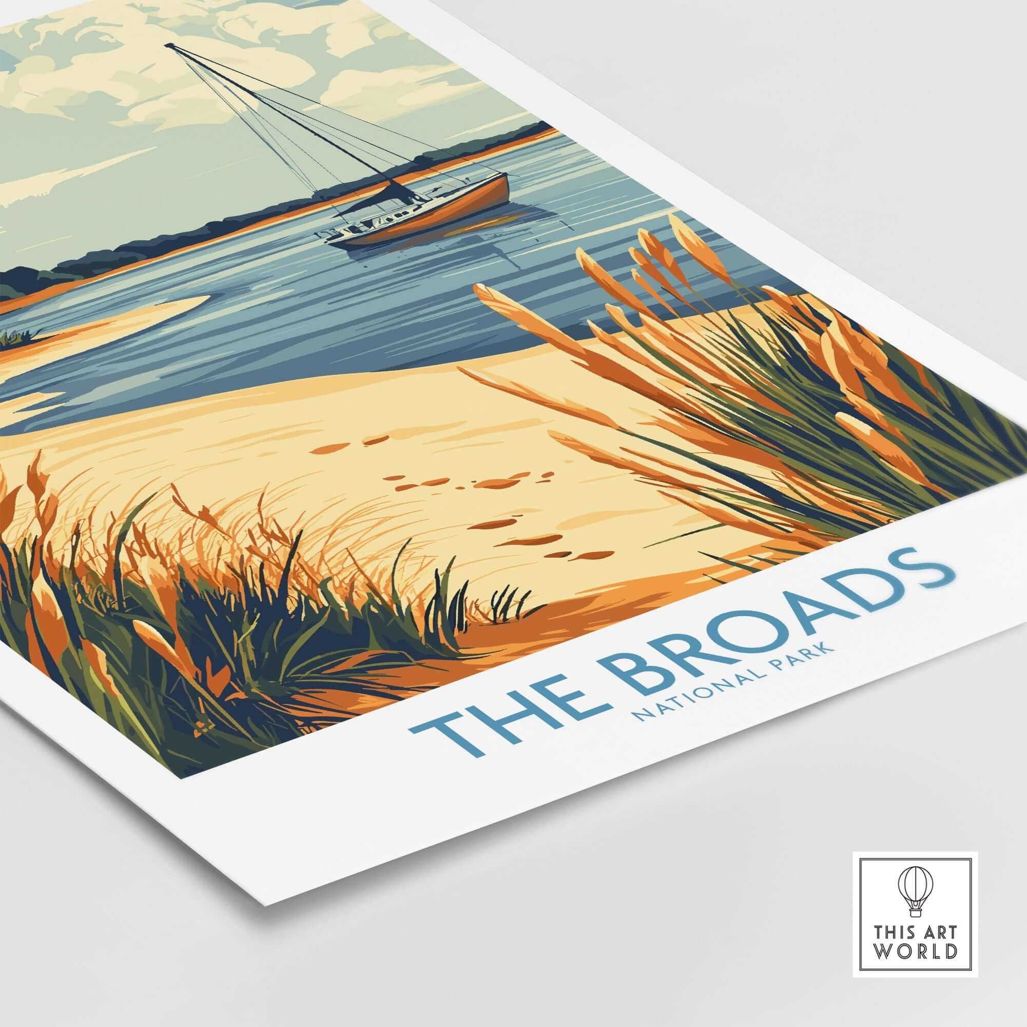 The Broads National Park Poster showcasing a tranquil river scene with a sailboat and lush reeds.