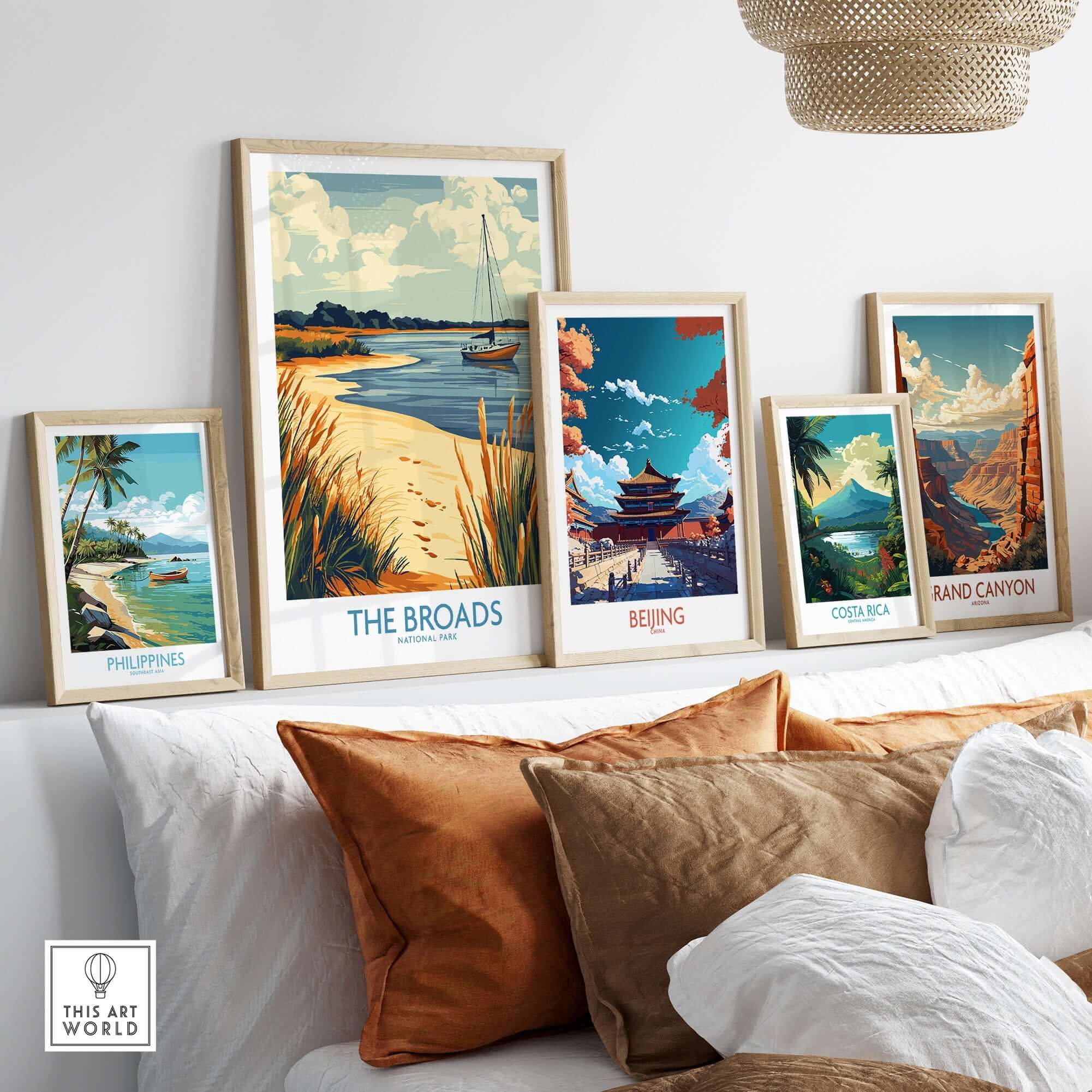 The Broads National Park Poster displayed among various travel posters in a stylish home setting.