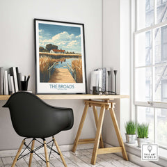 The Broads National Park Travel Poster displayed in a stylish interior with a desk and natural light.