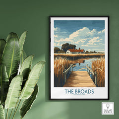 The Broads National Park Travel Poster featuring serene waterways and lush landscapes framed on a wall.