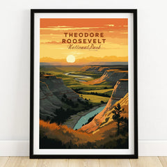 Theodore Roosevelt National Park art print in black frame on wooden floor, sunset landscape.