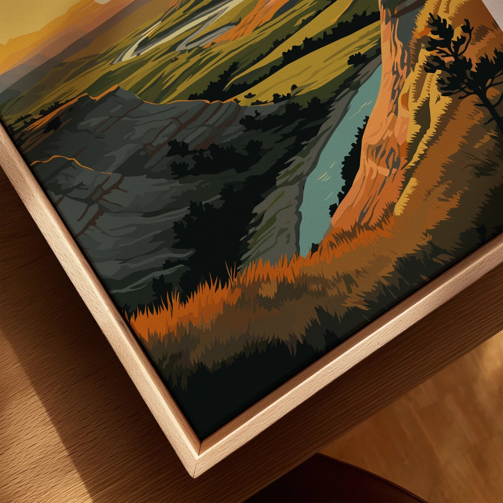 Closeup of framed canvas art featuring scenic landscape with hills, river, and vibrant colors.