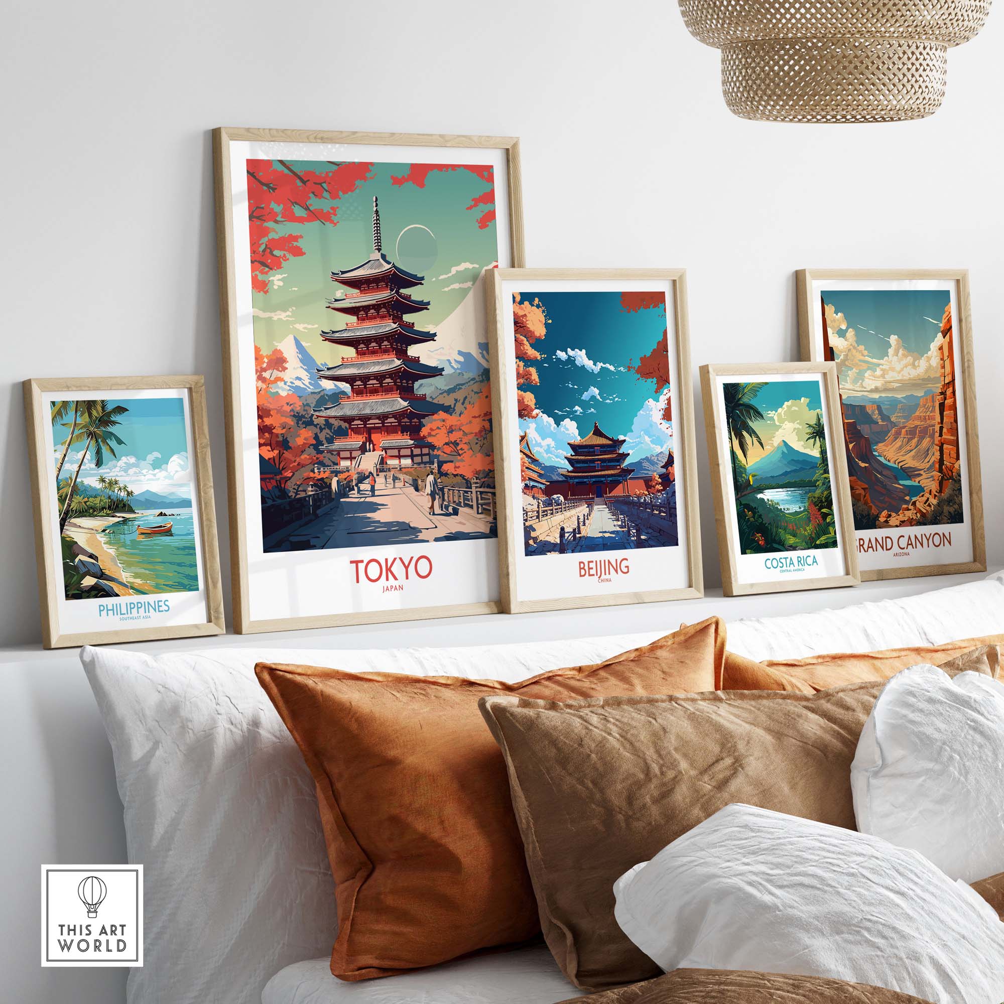 Framed art prints of Tokyo, Beijing, Philippines, Costa Rica, and Grand Canyon in modern decor setting.