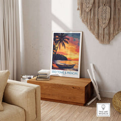 Tranquil Beach Sunset: São Tomé & Príncipe Art Print displayed in a cozy living room setting, featuring vibrant sunset colors.