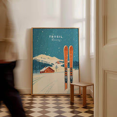 Trysil Ski Wall Art Print Norway showcasing a snowy landscape with skis and a Norwegian cabin in a cozy interior.