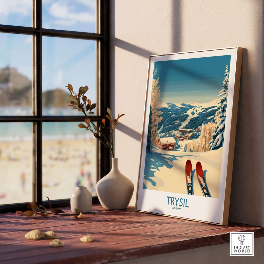 Trysil Ski Poster showcasing snow-covered mountains and ski slopes, displayed on a table beside a window.