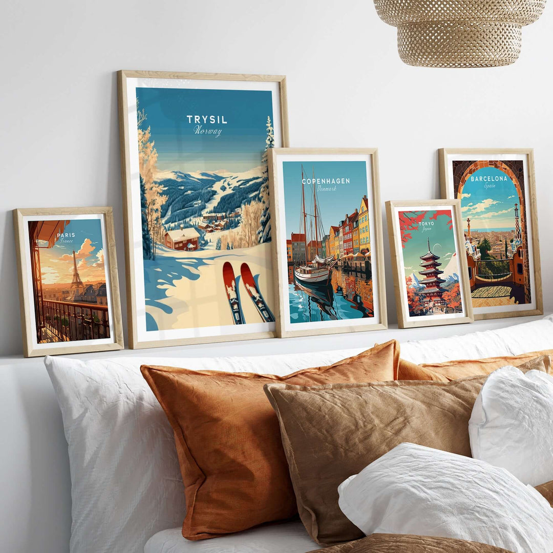 Collection of framed prints featuring Trysil, Copenhagen, and Barcelona, showcasing winter sports and city landscapes.