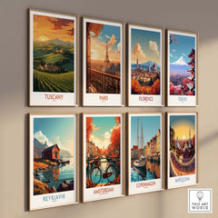 Wall display of travel posters featuring Tuscany, Paris, Florence, Tokyo, Reykjavik, Amsterdam, Copenhagen, and Barcelona.