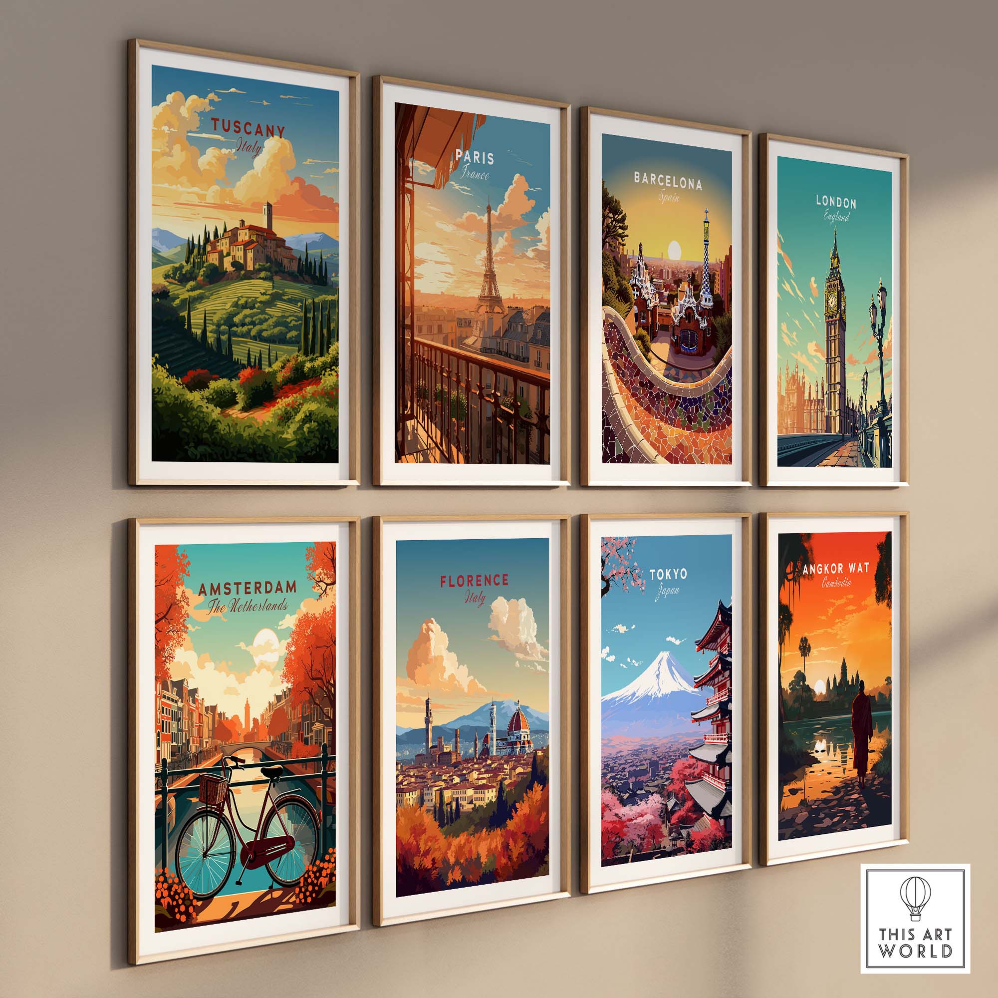 Gallery wall featuring travel posters of Tuscany, Paris, Barcelona, London, Amsterdam, Florence, Tokyo, and Angkor Wat.