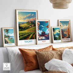 Tuscany wine poster among vibrant travel prints, showcasing beautiful landscapes and cultural scenes in a cozy setting.