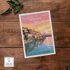 Beautiful Skiathos Greece travel poster print featuring a sunset over coastal town and serene waters.