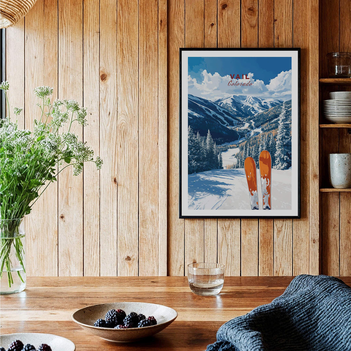 Vail Travel Poster - Colorado featuring skis on a snowy path with stunning mountain views in a cozy interior setting.