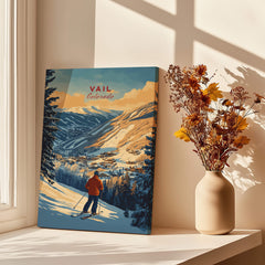 Vail Print Colorado Ski Poster displayed on a tabletop with a vase of flowers, showcasing stunning mountain scenery.