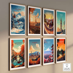 Framed travel prints showcasing winter scenery and iconic cities like Val Cenis, Paris, and Tokyo on a gallery wall.