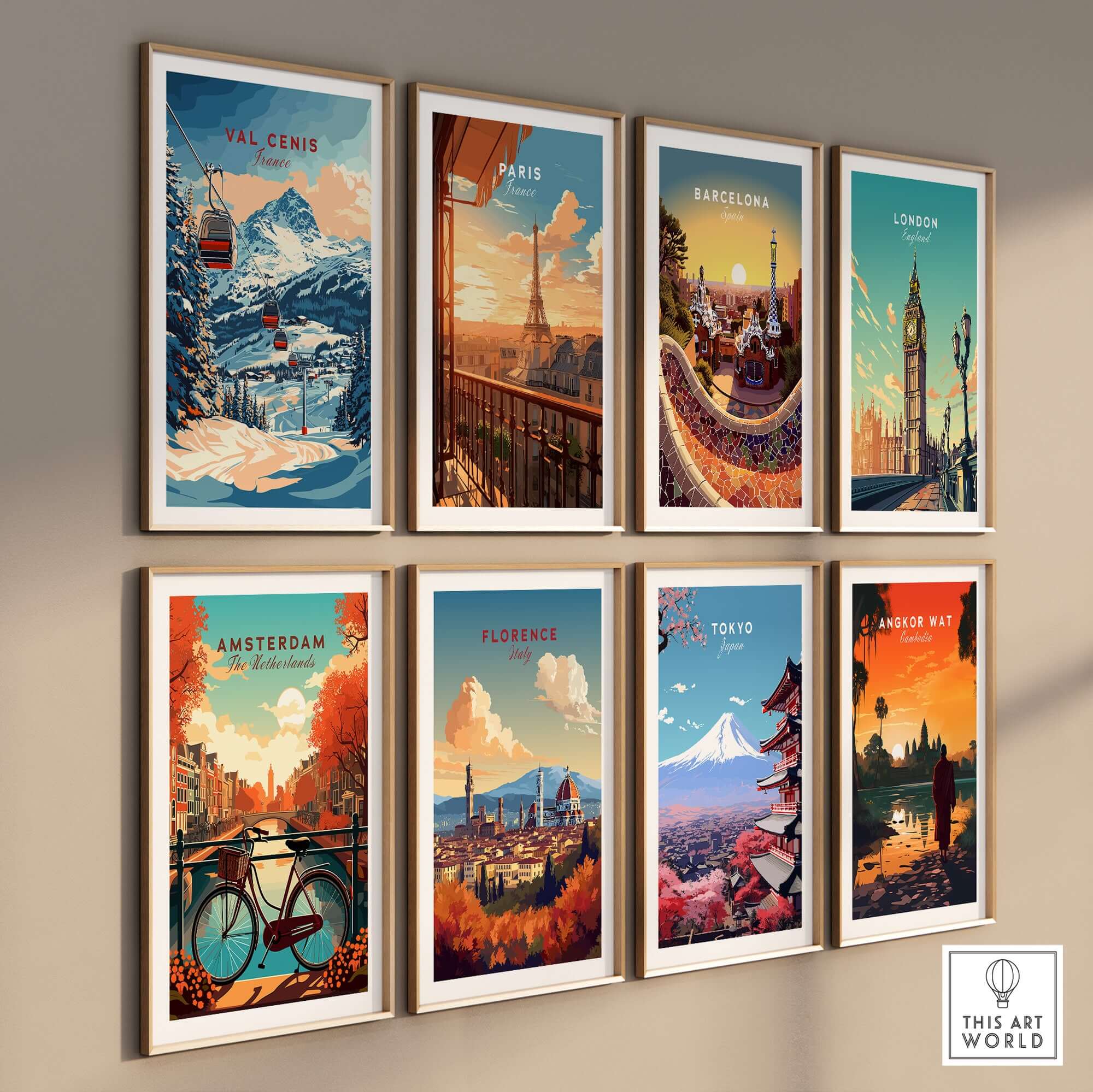 Framed travel prints showcasing winter scenery and iconic cities like Val Cenis, Paris, and Tokyo on a gallery wall.