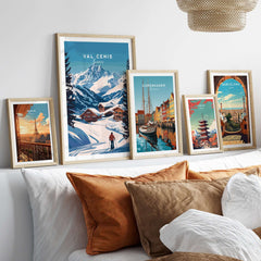 Val Cenis Ski Print featured among framed travel posters, enhancing winter decor with outdoor adventure themes.