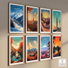 Gallery wall with vibrant travel posters featuring Val Cenis, Paris, Barcelona, London, Amsterdam, Florence, Tokyo, and Angkor Wat.
