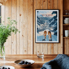 Val d'isere Print featuring a stunning ski view in a cozy home setting with wooden decor and fresh flowers.