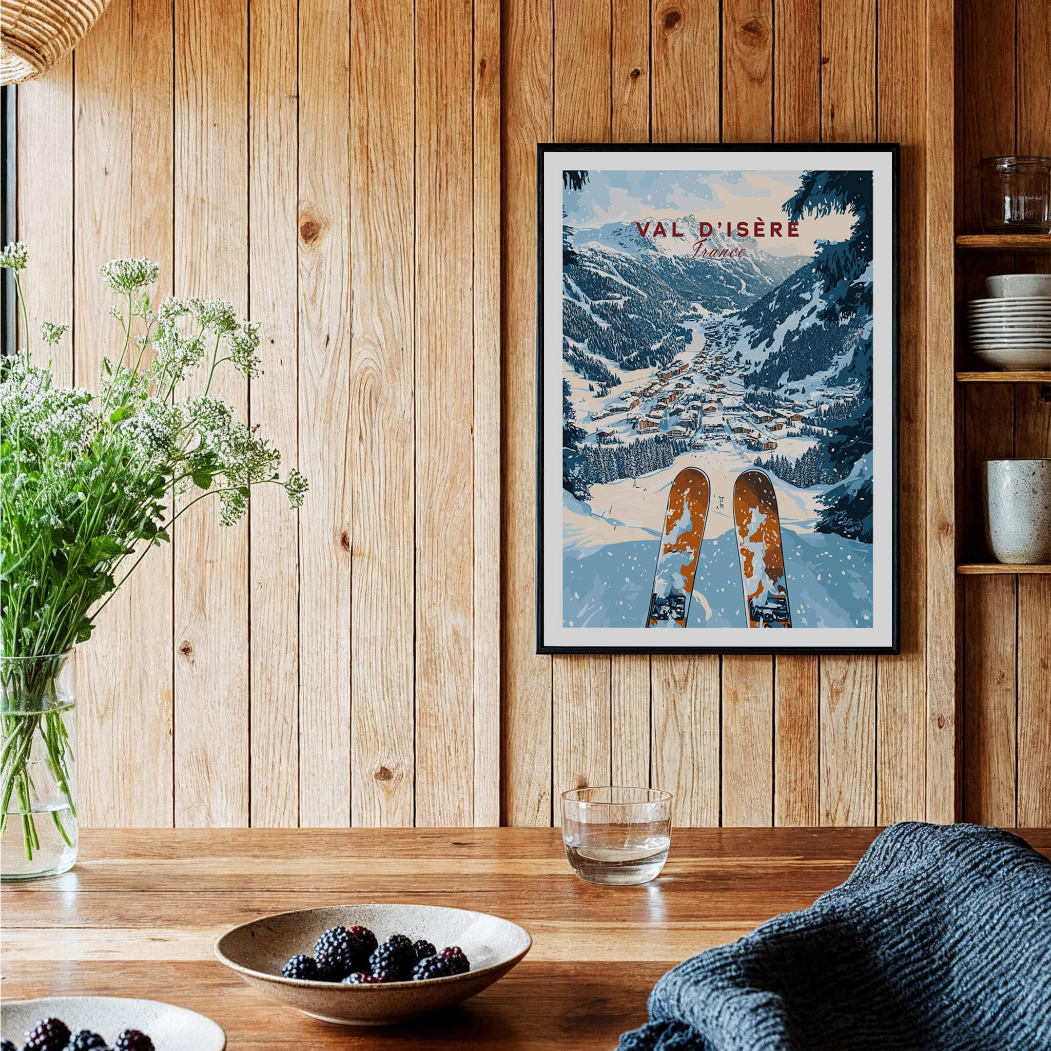 Val d'isere Print featuring a stunning ski view in a cozy home setting with wooden decor and fresh flowers.