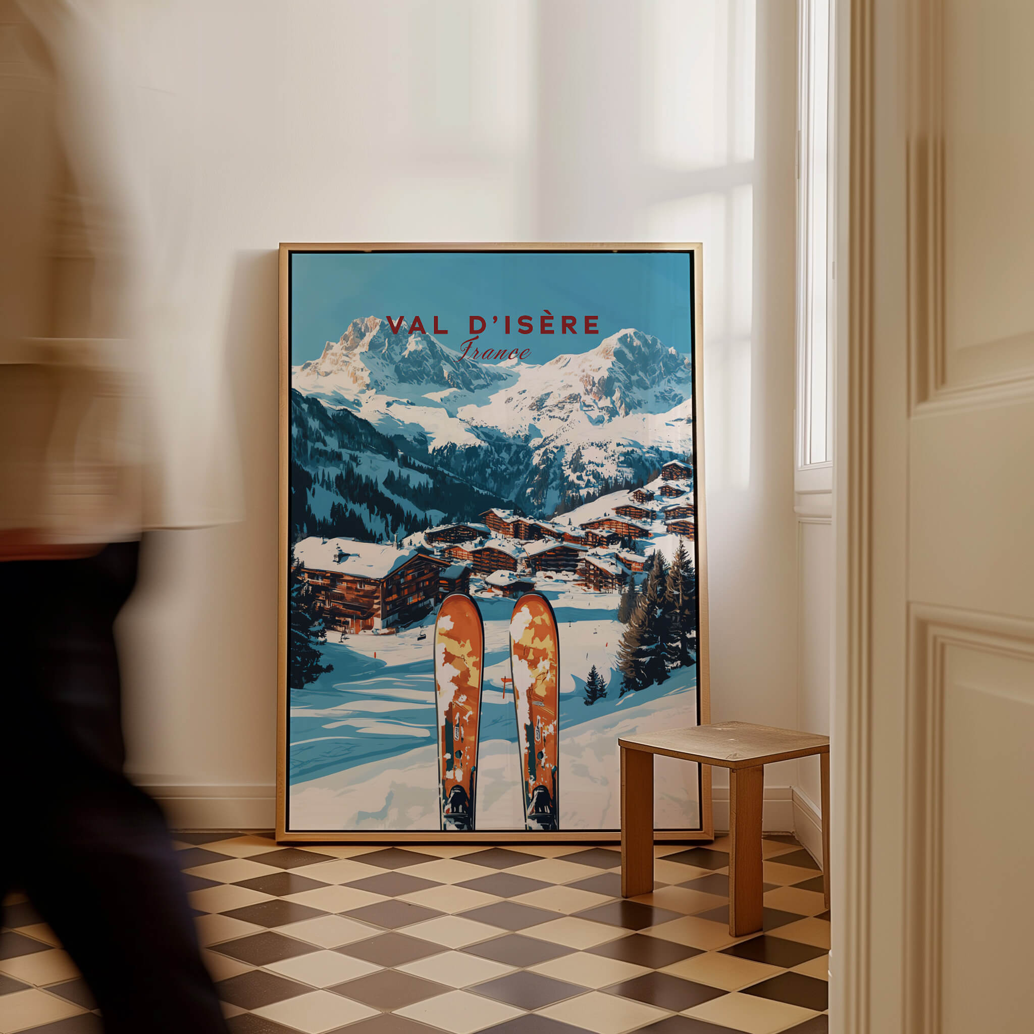 Val-d'Isère Ski Print featuring a scenic mountain backdrop and ski gear in a stylish interior setting.