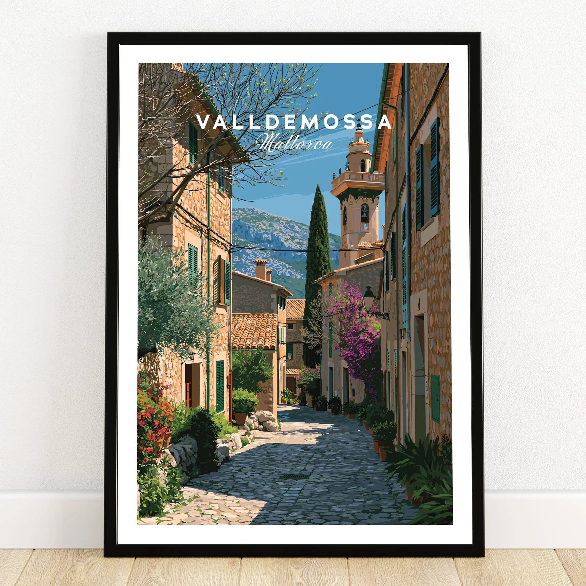 Valldemossa Mallorca Old Town Travel Poster — art print in black frame on wooden floor