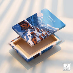 Verbier Travel Print showcased on a decorative box with a stunning mountain landscape design.