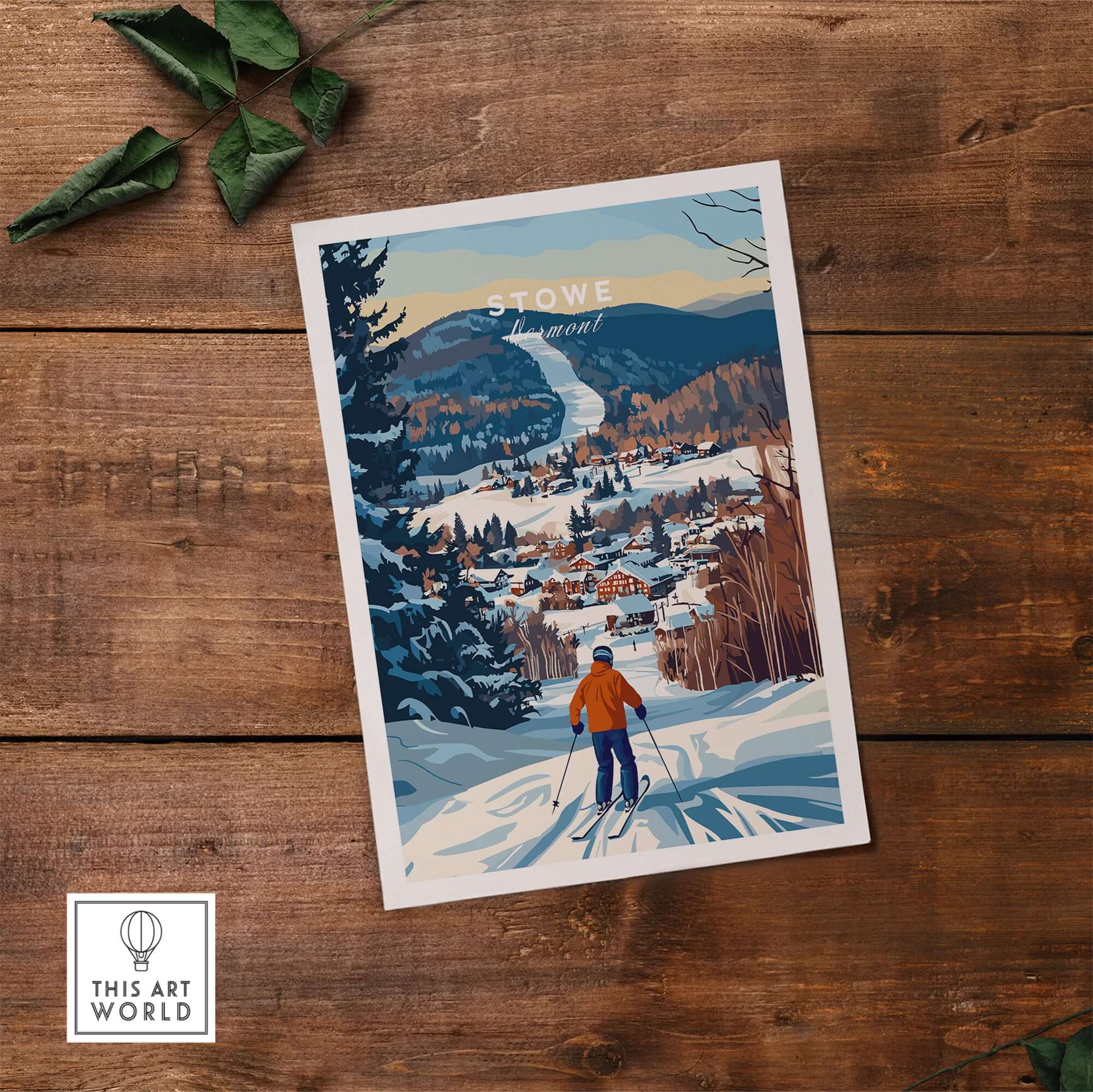 Stowe Mountain landscape art print featuring a skier overlooking a snowy village and mountains.