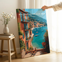 Villefranche-sur-Mer France travel poster print with coastal view, hand holding canvas in modern room