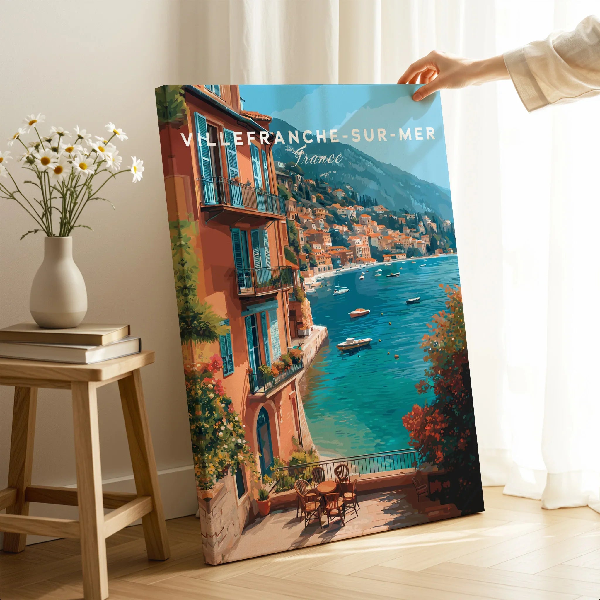 Villefranche-sur-Mer France travel poster print with coastal view, hand holding canvas in modern room