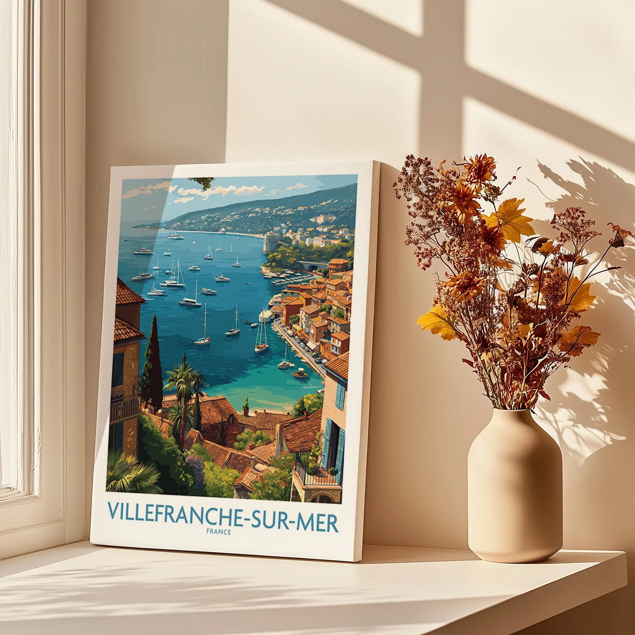 Villefranche-sur-Mer travel poster canvas print on windowsill with dried flowers and sunlight