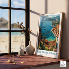 Villefranche-sur-Mer travel poster framed print on windowsill with beach view
