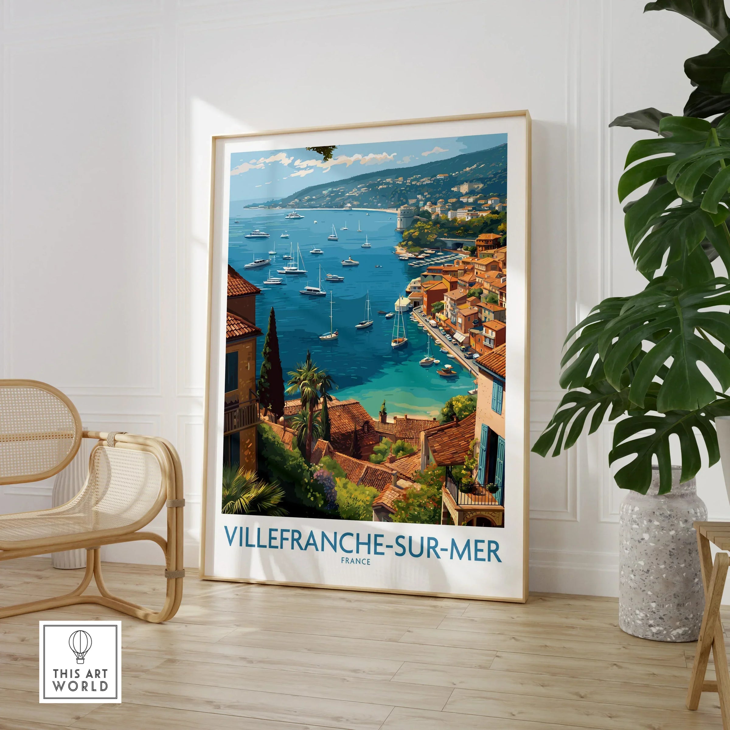 Villefranche-sur-Mer travel poster wall art in modern room with chair and plant