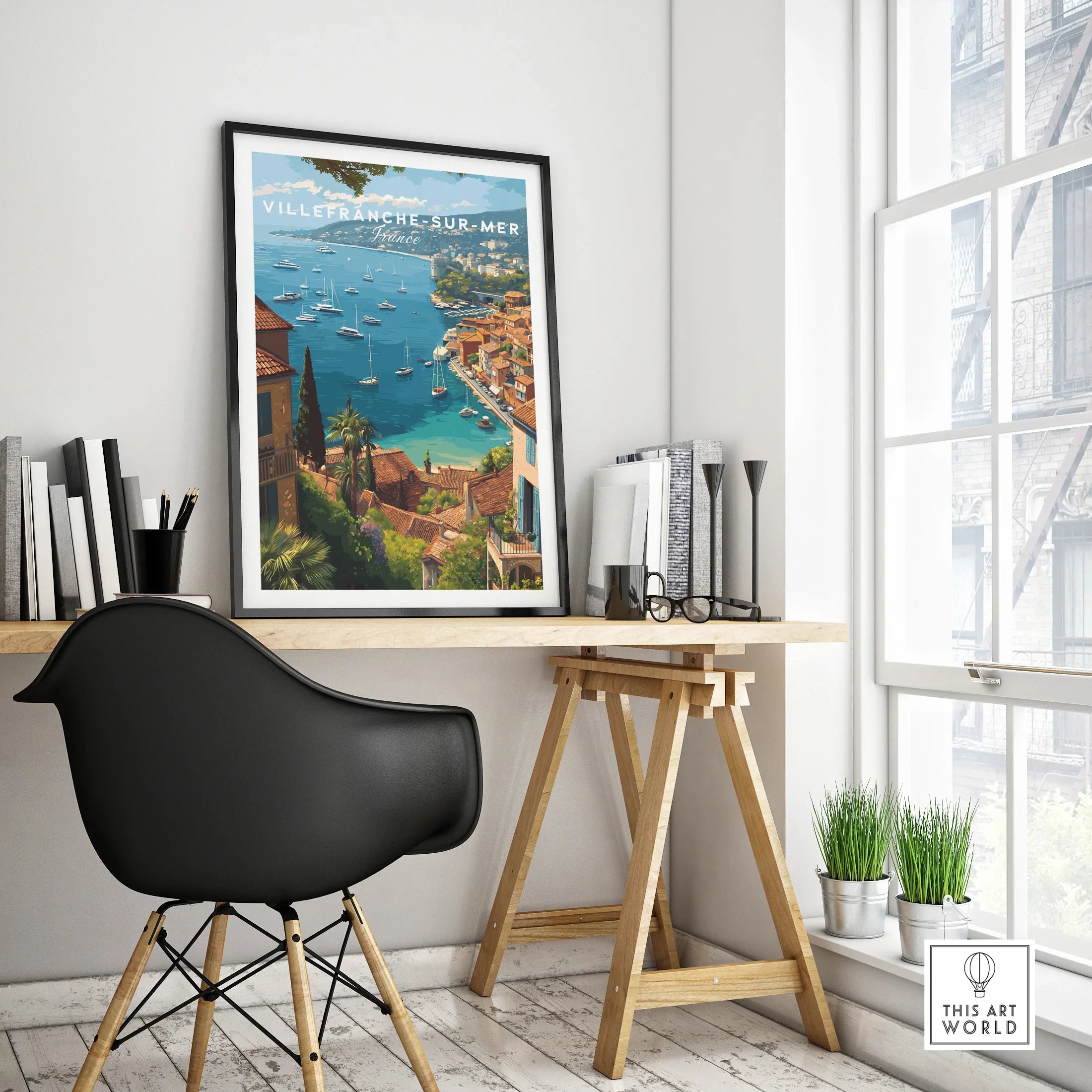 Villefranche-sur-Mer travel poster with black frame on modern office desk, coastal wall art