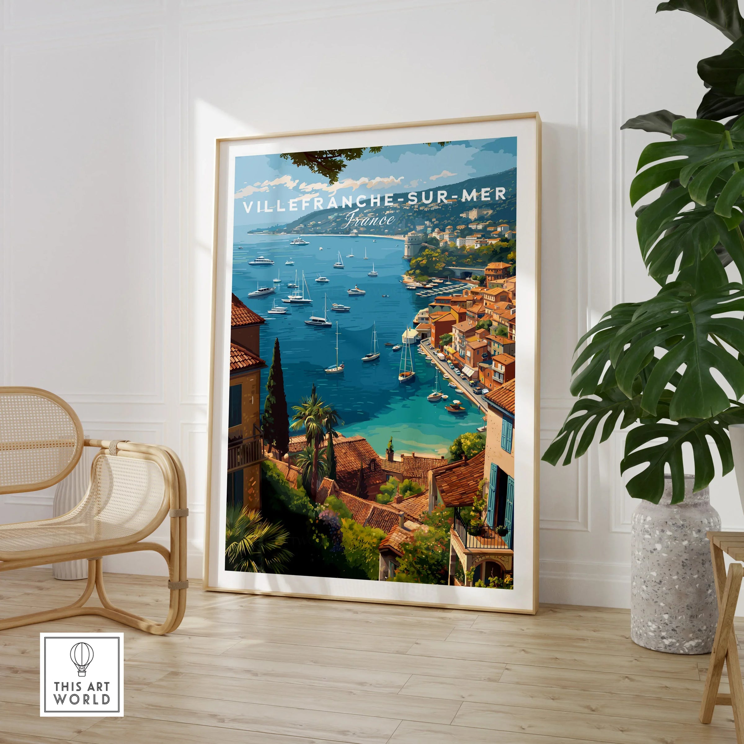 Villefranche-sur-Mer framed travel poster print in modern room with chair and plant