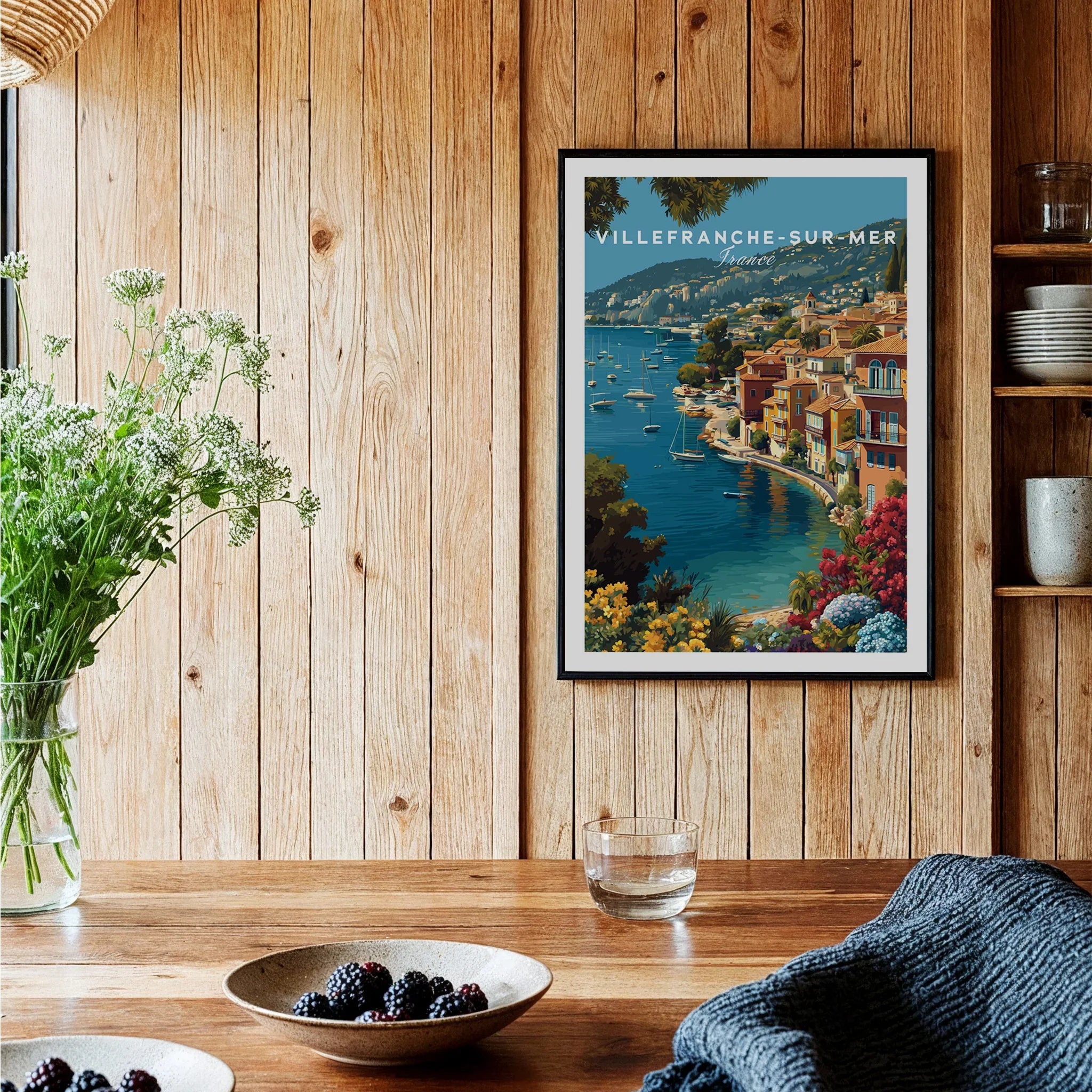 Villefranche-sur-Mer travel poster art print in black frame on wood kitchen wall, coastal decor