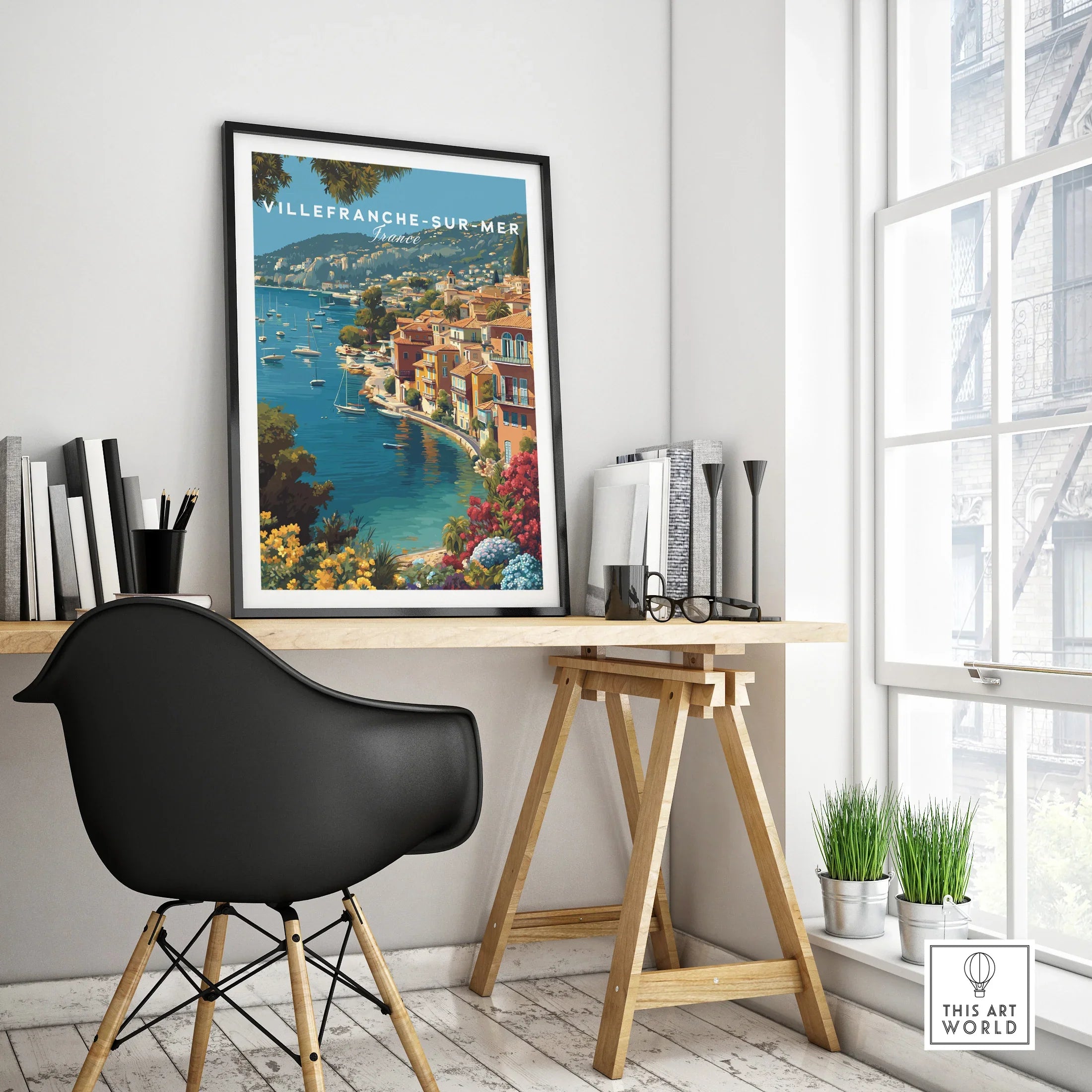 Villefranche-sur-Mer travel poster in black frame on modern office desk, home decor