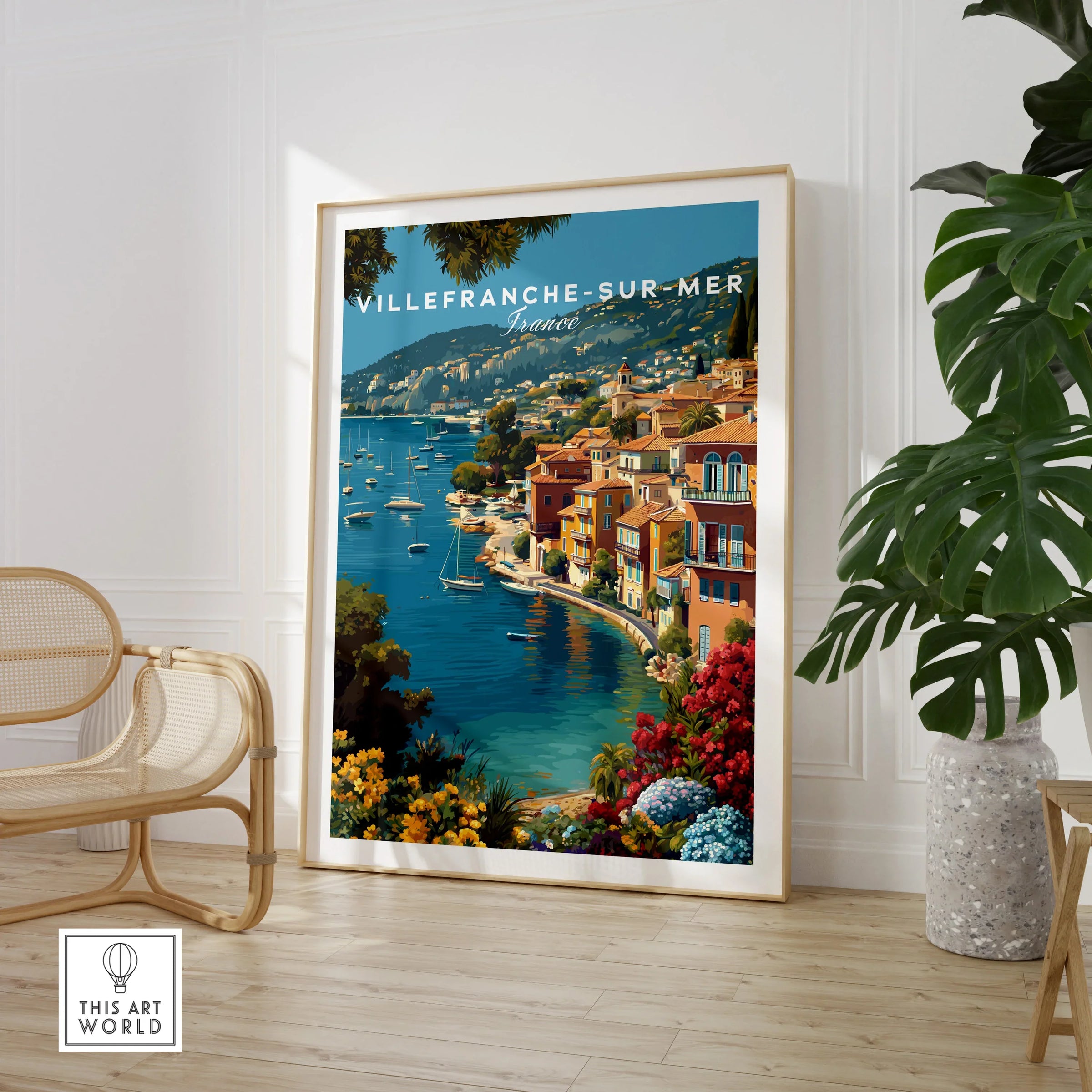 Villefranche-sur-Mer travel poster print in modern room with plant and chair