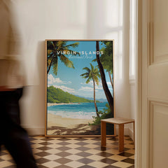Framed Virgin Islands National Park travel poster with beach scene, leaning on floor indoors.