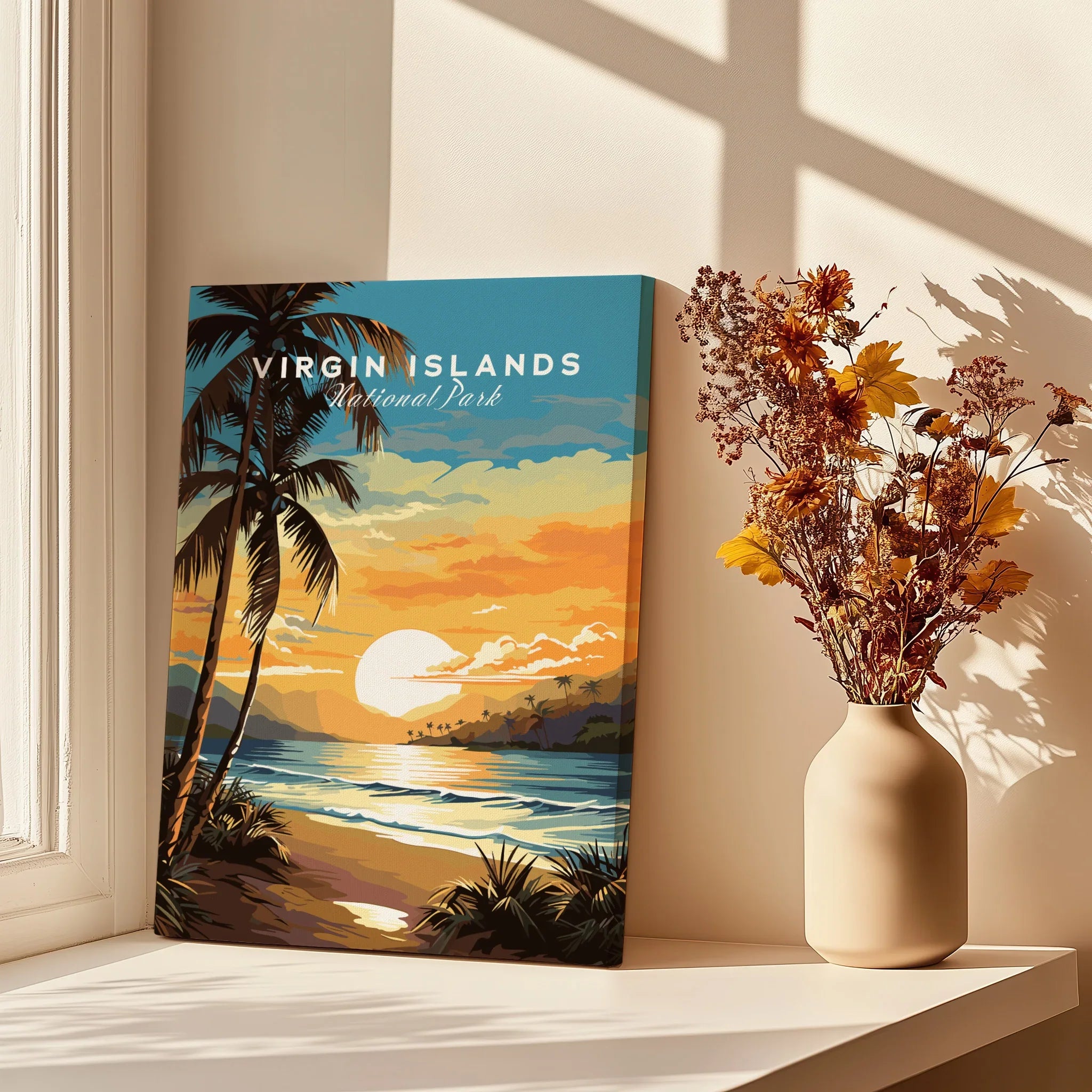 Virgin Islands National Park art print with sunset beach scene beside vase of dried flowers on windowsill