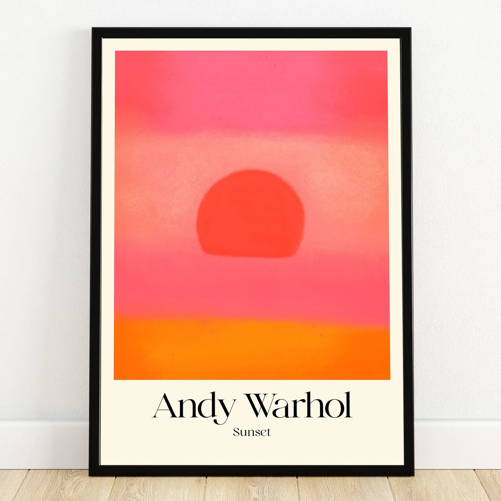 Framed Andy Warhol Sunset print with abstract sun and vibrant pink, orange gradient wall art