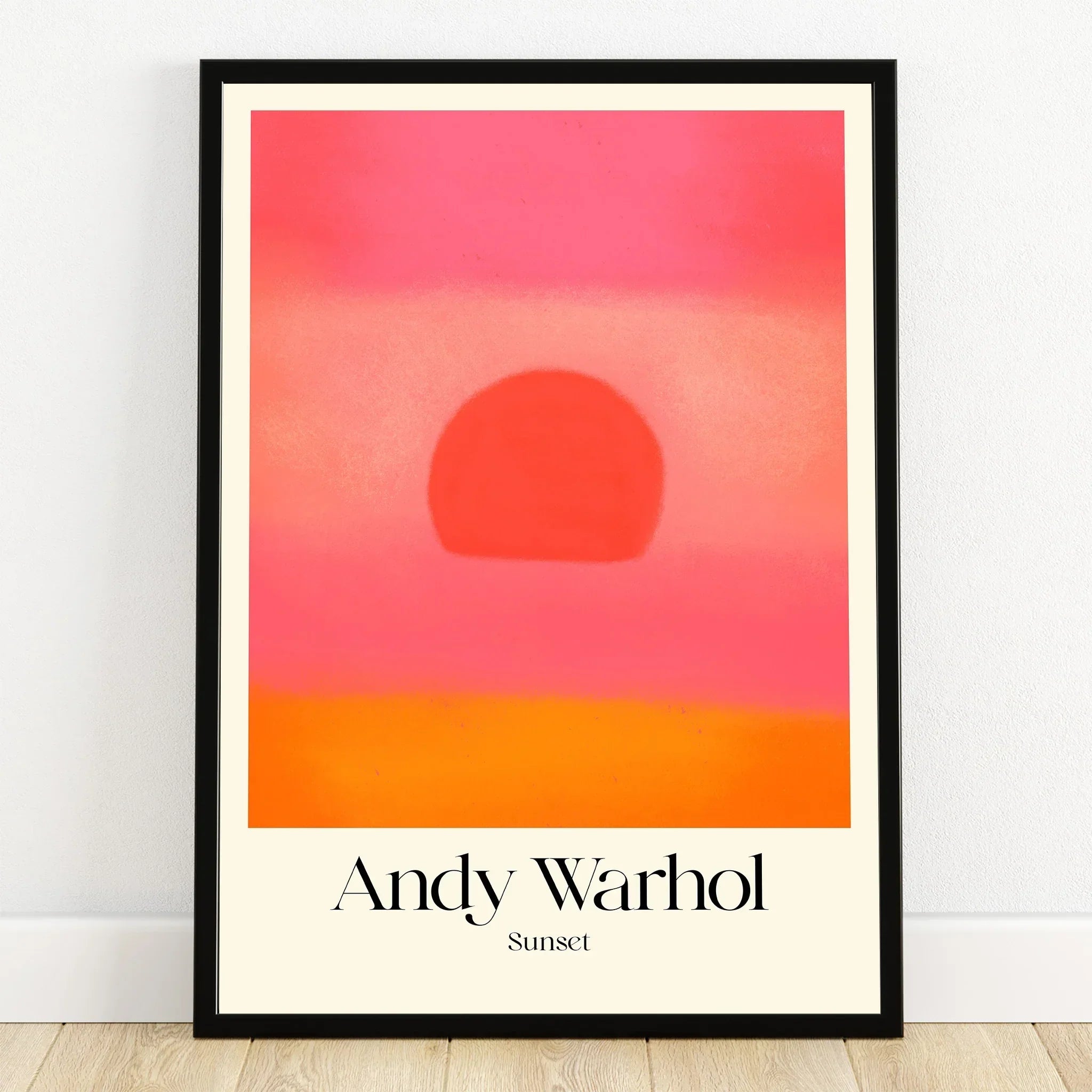 Framed Andy Warhol Sunset print with abstract sun and vibrant pink, orange gradient wall art