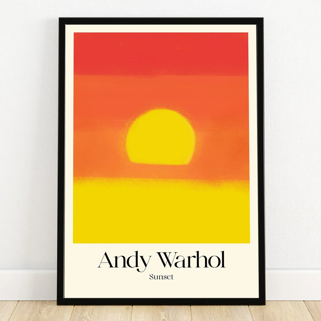 Framed art print of a vibrant yellow and orange sunset with 'Andy Warhol Sunset' text